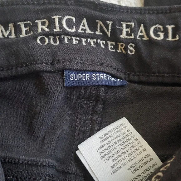 American Eagle Black Distressed Super Stretch  Mid Rise Jegging Size 4 Waist 27 - Picture 3 of 6